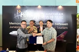 驻槟城总领事周游斌出席槟城环球旅游机构和吉祥航空签约仪式图片