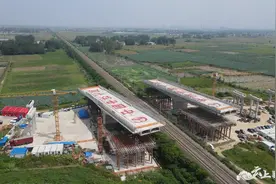 207国道襄州至宜城段改建工程T构桥转体顺利完成图片