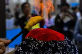 喝药饮、做火灸、正骨按摩......市民现场体验中医魅力图片