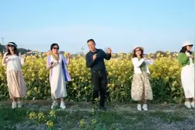 来村旅游人太少，衡阳50岁村支书花海跳舞走红：游客增了好几千，说想看我图片