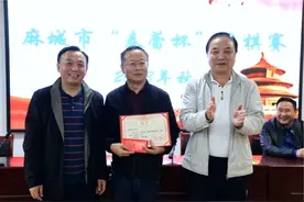 麻城举行首届“春蕾杯”围棋赛图片