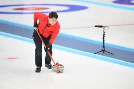 从“门外汉”到“行家里手”——如何欣赏冰壶混双比赛图片