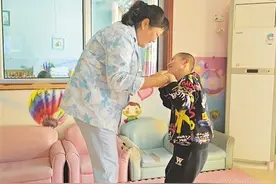 以爱之名 守护心灵——走近福利院里的“爱心妈妈”图片