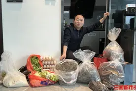 2025春运进行时｜后备箱塞满五十公斤土特产到广东，分给邻居同事图片