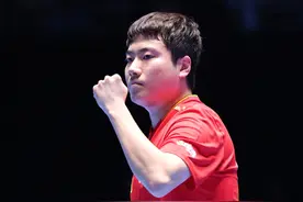 梁靖崑战胜张本智和，晋级男单半决赛图片