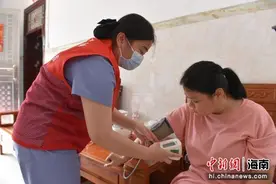 屯昌“小屯妹”“大昌叔”志愿服务暖人心图片