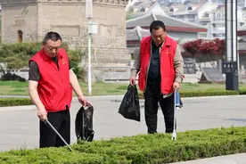 山东滕州：志愿服务 美化环境图片