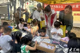 济宁高新区洸河街道西闸社区开展DIY扇子绘画活动图片