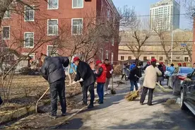 哈尔滨香坊：环境整治、文明宣传 志愿者在行动图片