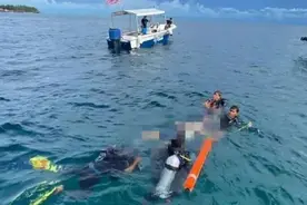 马来西亚水下发现中国游客遗体，“背包内有三块砖头”图片