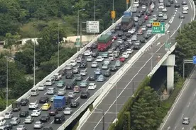 广州机场高速公路将扩建成10到14车道图片