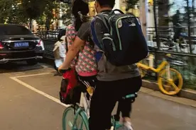 男子坐共享单车车筐里意外摔亡 同车骑行人担全责！图片