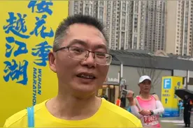 57岁业余跑者赞美汉马：小雨降温有利于发挥，整个城市到处是樱花氛围，争取再来一次图片