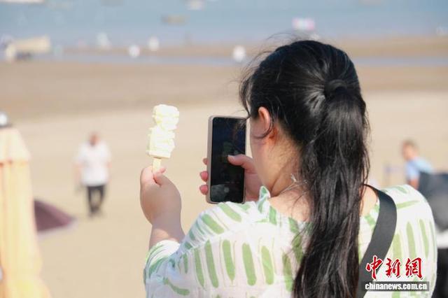 （活力中国调研行）浙南小城有“凉”方：“168黄金海岸”人气足