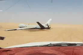 胡塞武装称又击落1架美军“死神”无人机 现场曝光：机身完整趴窝沙漠中图片