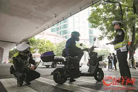 正式开罚！广州电动自行车限行新规“动真格” 半天查处907宗违规行为图片