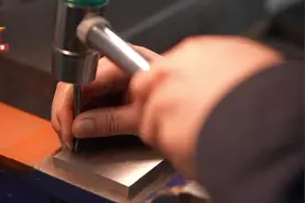 0.00068毫米！90后高级技师为战机造精密零件图片