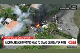 法媒：首批法国游客在新喀里多尼亚骚乱中撤离，目前骚乱已致7人死亡图片