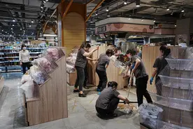 探访暴雨突袭后的长沙：进水店铺已重新营业，旅客无法想象火车站曾有积水图片