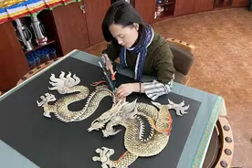 她让非遗鱼皮画活了图片