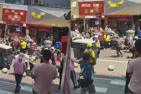 西安一男子推搡殴打辅警被刑拘，目击者：男子拿凳子砸中辅警后被制服，知情人称嫌犯非法营运图片