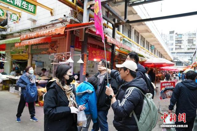 农贸市场里感受“有一种叫云南的生活”