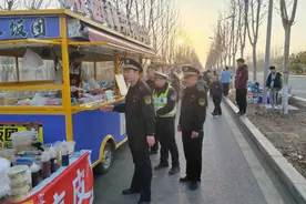 泰安市岱岳区综合行政执法局山口中队开展校园周边环境综合整治行动图片