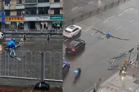 宜昌一外卖小哥顶风雨独自清理道路路障被爆赞，目击者：我还在犹豫他已经停车清障了图片