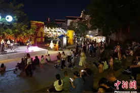 AI赋能+商文旅体健联动 “五一”假期广西消费市场活力十足图片