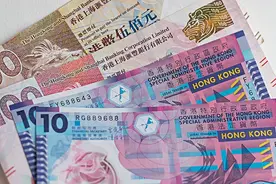 一个国家两种货币！香港回归多年，为何还没把港币换成人民币？图片