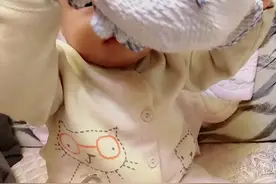 九个月宝宝，不喜欢戴帽子