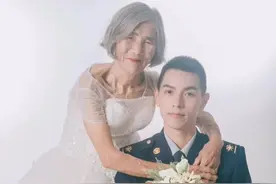 相差61岁的“婚纱照”背后，是浓浓的祖孙情。“虽然她身板很小，个子很矮，但她扛起了很多东西，内心很强大。”视频封面