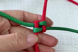 #纯手工编绳 #我的手工作品 #手工 #手工diy #玉米结 方形玉米结慢动作学会的家人点亮你的❤️吧视频封面