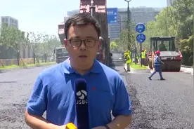 高温下的坚守：脚踩120℃滚烫沥青 他们“汗”卫城市美好图片